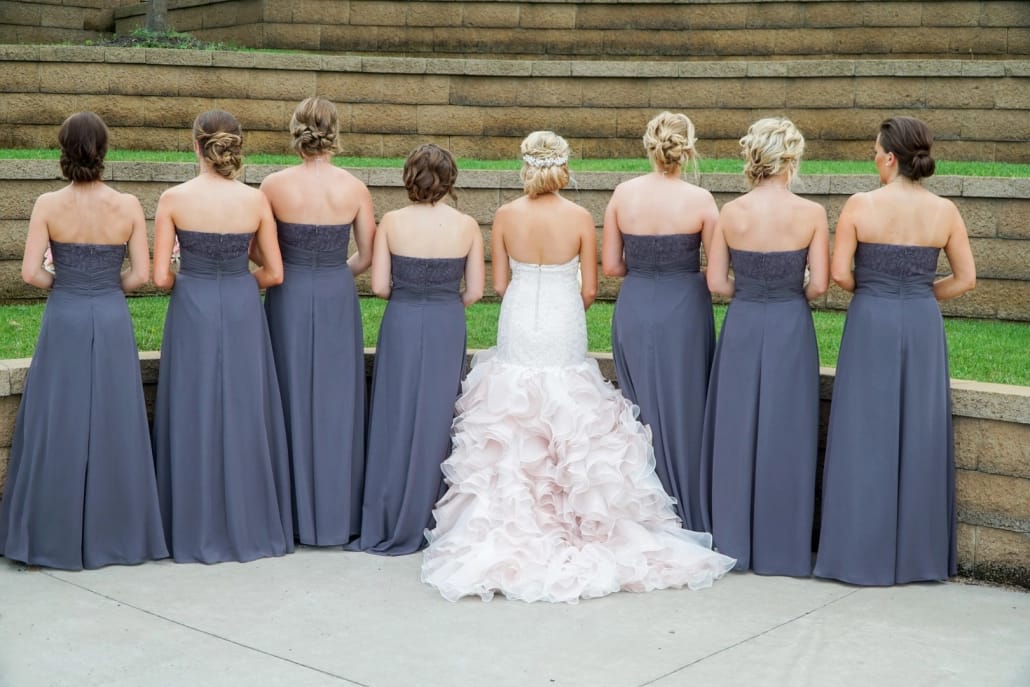 one or two dresses? Bride wearing traditional ballgown wedding dress for ceremony before changing into reception dress