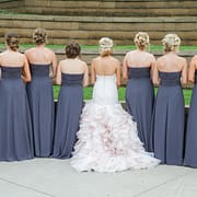 Bride wearing traditional ballgown wedding dress for ceremony before changing into reception dress