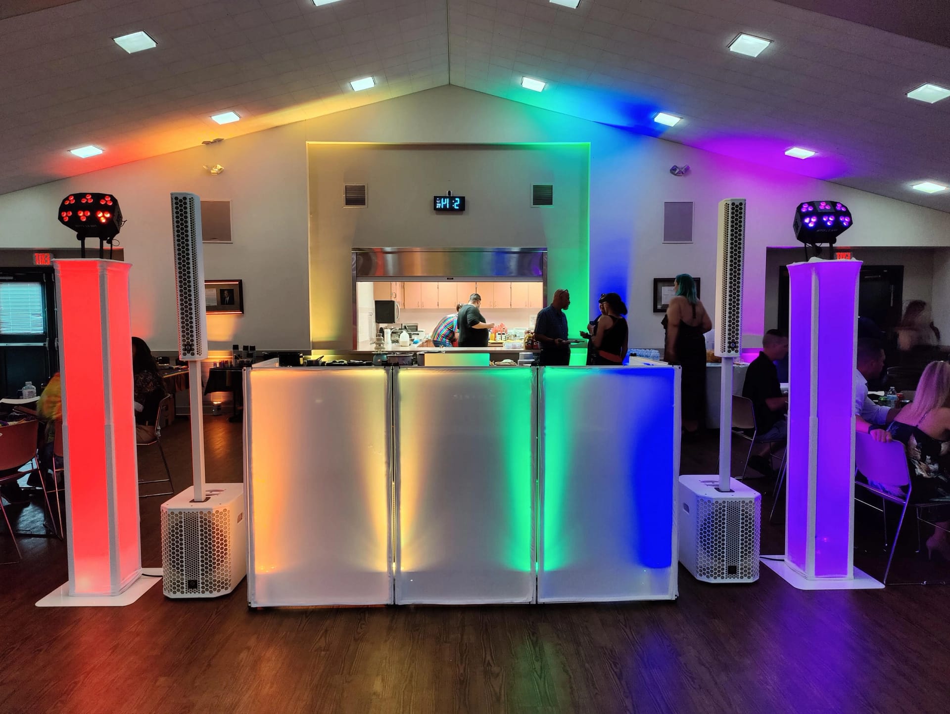 wedding DJ using lighting to transform LGBT wedding